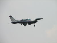 N1914G @ IPT - Gear coming up.  On their way to (EVV) Evansville Indiana - by Sam Andrews