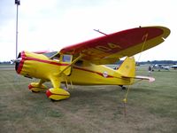 N21104 @ KOSH - Stinson SR-10J - by Mark Pasqualino