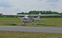 N7897F @ N51 - This 1966-vintage Cessna two-seater still gleams after four decades. - by Daniel L. Berek