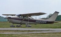 N6849M @ N51 - This 1975 Skylane is keeping an older Cessna 150 company on a lazy summer afternoon. - by Daniel L. Berek
