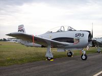 N280JM @ KOSH - North American T-28C - by Mark Pasqualino