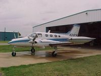 N318TW - Plane in front of hangar - by unknown