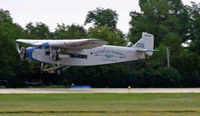 N8407 @ OSH - Ford Tri-Motor on final at Airventure 2006