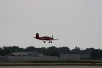 N42DE @ KOSH - N42DE landing at Airventure 2006 - by Raj Upadhyaya