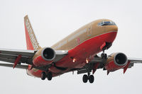 N738CB @ LAX - Southwest Airlines N738CB (FLT SWA2537) from Las Vegas McCarran Int'l (KLAS) on final approach to RWY 24R.
