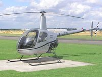 EI-DKI @ EGBW - Robinson R-22 at Wellesbourne - by Simon Palmer