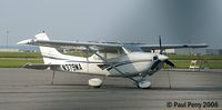 N379MA @ ECG - A visitor from afar, gleaming in the sun