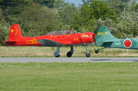 N522TW @ RKD - taking off at an Owls Head Transportation Museum airshow - by Jason Philbrook