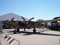 N138AM @ KOSH - Lockheed P-38J - by Mark Pasqualino