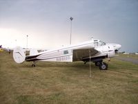 N9918R @ KOSH - Beech G18S - by Mark Pasqualino