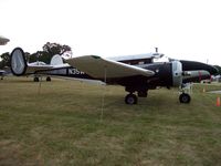 N35W @ KOSH - Beech D18S - by Mark Pasqualino