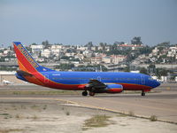 N389SW @ SAN - Southwest 737-3H4 in new colors taxying @ San Diego, CA - by Steve Nation