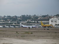 N392AE @ SAN - American Eagle SAAB-340B taxying @ San Diego, CA - by Steve Nation