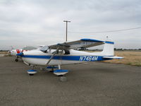 N7464M @ MER - Straight Tail 1959 Cessna 175 in lousy weather @ Castle AFB, CA - by Steve Nation