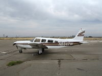 N8347W @ MER - Countryboy LLC 1981 Piper PA-32R-301 in lousy weather @ Castle AFB, CA - by Steve Nation