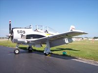 N280JM @ KOSH - North American T-28C - by Mark Pasqualino