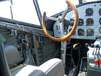 N352JU @ OSH - a rather spartan left seat