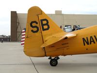 N89014 @ MER - Close-up of Commerative Air Force SNJ-5 SB/ (BuAer 84865) in poor weather @ Castle AFB, CA - by Steve Nation