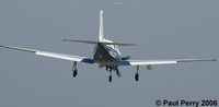 N822DK @ PVG - Over the numbers, and coming down.  Decent view of the pod under the starboard wing