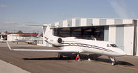 N20EG @ ISP - EG gets a landing light replaced on the A&P ramp....