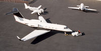 N900TJ @ ISP - At the Garrett Ramp, 900TJ readies for pushback...