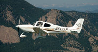 N512AP - N512AP flying past the Flatirons, Boulder CO - by Ed Post