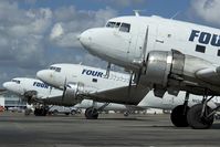 N133FS @ SJU - Four Star Cargo DC3 line up - by Yakfreak - VAP
