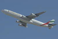 A6-ERT @ DXB - Emirates Airbus A340-300 taking off at Dubai - by Yakfreak - VAP