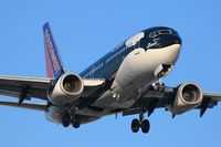 N715SW @ LAX - Southwest Airlines N715SW Shamu (FLT SWA563) from Metropolitan Oakland Int'l (KOAK) on final approach to RWY 24R.