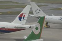 B-16305 @ VIE - Eva Air Airbus A330-200 together with 9M-MRM and OE-LAO - by Yakfreak - VAP
