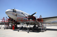 N53594 @ CMA - 1944 Curtiss Wright C-46F Commando N53594 China Doll undergoing engine maintenance at Camarillo Airport (CMA). - by Dean Heald