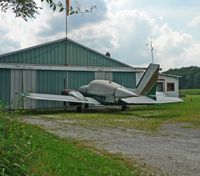 N98M @ 13N - Piper Aztec rests in front of Trinca Airport corporate headquarters. - by Daniel L. Berek