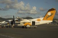 N387BC @ SXM - Carribean Sun Dash8-100 in the evening sun