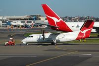 VH-TQU @ SYD - Being towed to the gate - by Micha Lueck