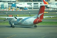 VH-TQY @ SYD - Taxiing to the runway for take-off - by Micha Lueck