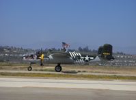 N30801 @ CMA - 1944 North American B-25J MITCHELL 'Executive Sweet', two Wright R-2600s 1,700 Hp each, taxi (flag about to be taken down) to Runway 26 - by Doug Robertson