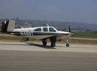 N488T @ CMA - 1961 Beech N35 BONANZA, Continental IO-470-N 260 Hp, taxi - by Doug Robertson