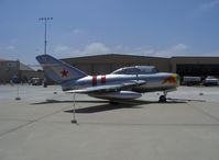 N687 @ CMA - 1953 Mikoyan-Gurevich MIG-15UTI as NX687 'Red Bull' tandem trainer, Klimov VK-1A 5,952 lb st afterburning turbojet, developed by Russia from captured WWII German data, MIG-15s first seen by the West in 'MIG Alley' in Korean War. - by Doug Robertson