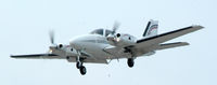 N124MD @ FRG - Baron short final at Republic... - by Stephen Amiaga