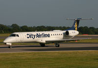 SE-DZB @ EGCC - City Embraer - by Kevin Murphy