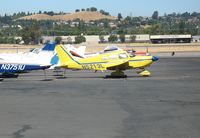 N5213L @ CCR - Sharp yellow & blue 1967 PA-28-180 @ Buchanan Field (Concord), CA - by Steve Nation