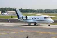 N404HG @ PDK - Taxing to Runway 2R - by Michael Martin