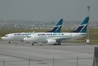 C-GWCY @ CYYC - 10th 600 for Westjet