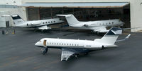 N20EG @ ISP - New Life at the old Garrett Hangar... - by Stephen Amiaga