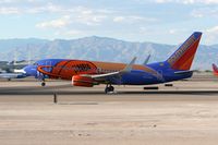 N224WN @ LAS - Southwest Airlines N224WN Slam Dunk (FLT SWA118) from Orlando Int'l (KMCO) touching down on RWY 25L.