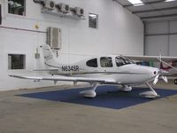 N634SR @ EGBT - Cirrus SR22 in the hangar at Turweston - by Simon Palmer