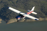 N20105 - N20105 flying over Folsom Lake in California - by Chris Luvara