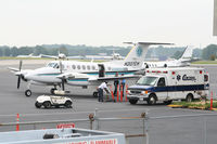 N207CM @ PDK - Preparing to transfer patient from aircraft to ambulance - by Michael Martin