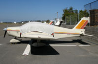 N4586R @ OKB - 1965 Piper PA-28-140 under cover @ Oceanside Municipal Airport, CA - by Steve Nation
