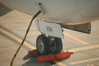 VH-VXH @ SYD - close-up of front landing gear - by Micha Lueck